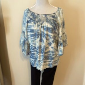 Tie-dyed smocked top.